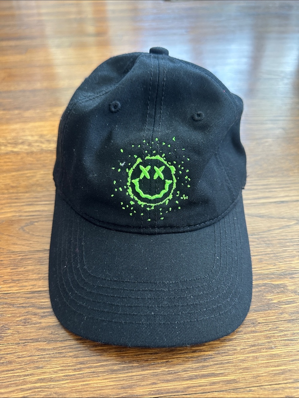 Black Dad Hat with Green Smiley Embroidery